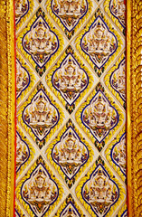 Golden Pattern of Thai art on Red wall in Thai Temple at Thailand. It is suit for use as Background