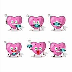 Photographer profession emoticon with pink cupid love arrow cartoon character