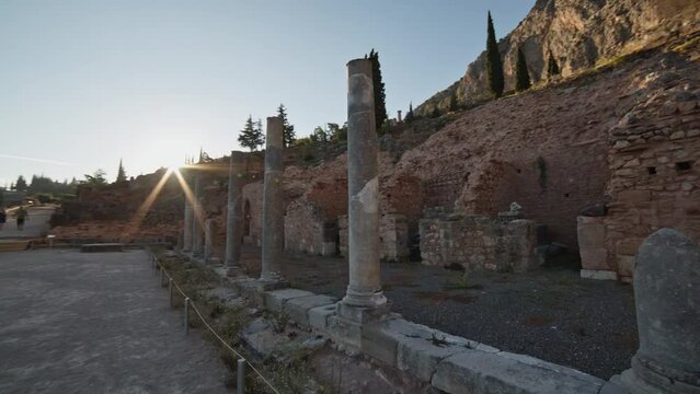 Delphi - circeling around parts of the ancient city in beautiful golden sunset light
