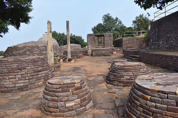 Way to Temple No 31 and pillars, Votive stupas, ancient Buddhist monument at Sanchi, Madhya Pradesh, India