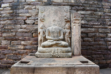 Stupa No 1, Defaced Buddha Statue Inside the Bern of  Stupa 1, Sanchi, UNESCO World Heritage Site, near Bhopal, Madhya Pradesh state, India.