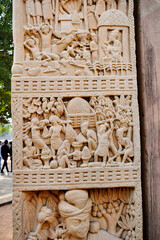 Stupa No 1, East Gateway,  Left  Pillar, Inside Panel 3:  Miracle of  wood and fire. Brahmanas were fire worshippers could not  spilt wood and create fire till Buddha's consent. 