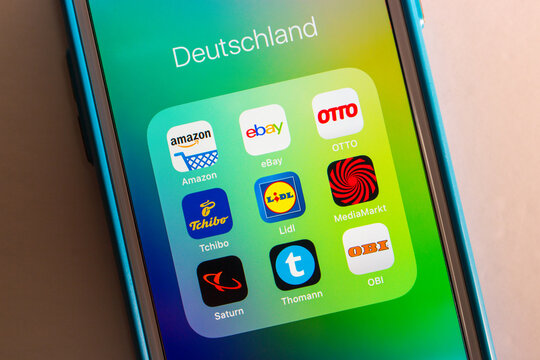 Kumamoto, Japan - Aug 25 2020 : Top German e-commerce platform / services (Amazon, eBay, OTTO, Tchibo, Lidl, MediaMarkt, Saturn, Thomas and OBI) icons on iPhone screen.