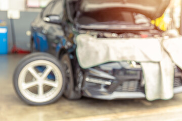 Fototapeta premium blur garage auto car engine and wheel tire service for motor advertising background