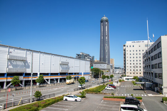Shimonoseki, Yamaguchi / Japan - Aug 14 2020 : .Cityscape Shimonoseki downtown area and Kaikyo Yume Tower in sunny day. Kaikyo Yume Tower is known as the tallest tower in western Japan.