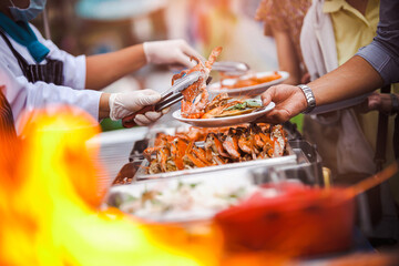 Chef Cater cooking main dish crab & shrimps BBQ serving for guest in wedding ceremony party or...