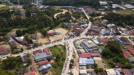 Flood situation at Hulu Langat district that causes damage of the infrastructure and housing area. Selective focus, contains dust and grain