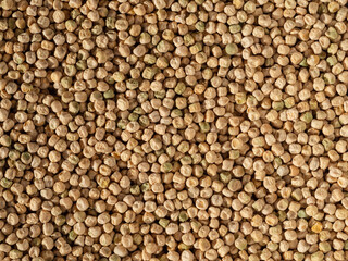 The natural food background is dried peas. Organic Dried Raw Peas as Background
