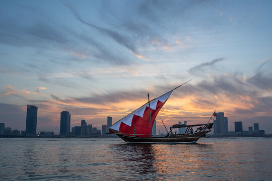 Bahrain flag on Old Boat in the middle of Muharraq Sea