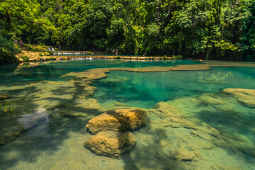Semuc champey natural bridge of limestone in the cahabon river of Guatemala in the middle of the...