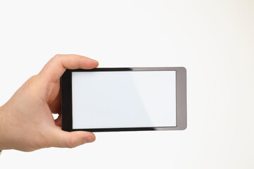 Person hold smartphone with white screen on white background
