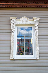 window with carved platbands