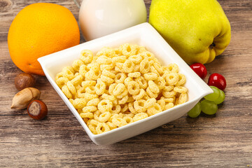 Breakfast with corn rings and milk