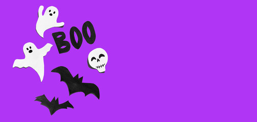 Halloween set decorations with ghost, bat, skeleton and word BOO on violet very peri background. Holiday party, minimal greeting card, spooky concept. flat lay, copy space, top view, place for text