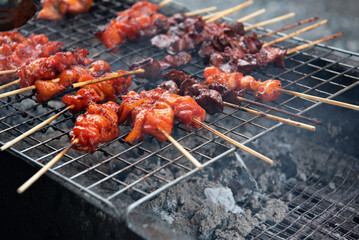 Grilled chicken sauce at Thai street food market