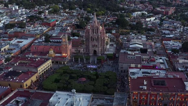 Aerial: scenic view of a cathedral church and city in the evening. Drone view 