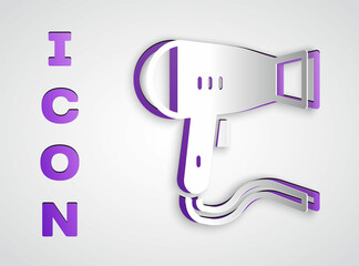 Paper cut Hair dryer icon isolated on grey background. Hairdryer sign. Hair drying symbol. Blowing hot air. Paper art style. Vector