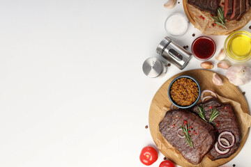 Concept of tasty food with beef steaks, space for text