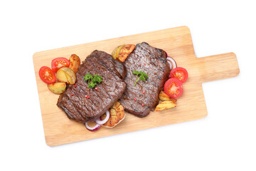 Cutting board with beef steaks and ingredients isolated on white background