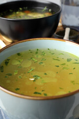 Concept of tasty food with chicken soups or broths, close up