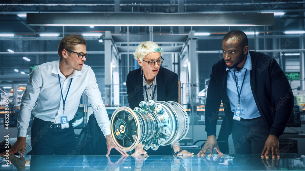 Poster Green Energy Car Design: Diverse Team of Automotive Enginers Using Augmented Reality Hologram to Construct 3D Model of High-Tech Electric Engine Turbine. Futuristic Automated Robot Arm Manufacturing