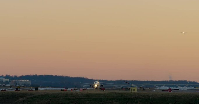 Plane Taking Off After Sunset Framed By Dramatic Orange Sky, Washington D.C.