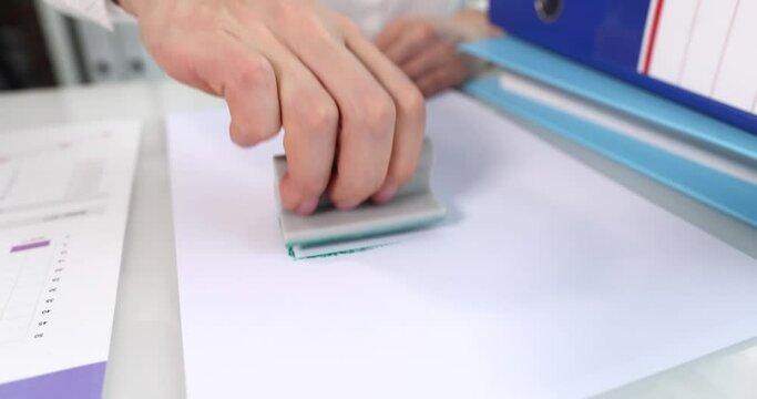 Business woman puts seal of approval closeup