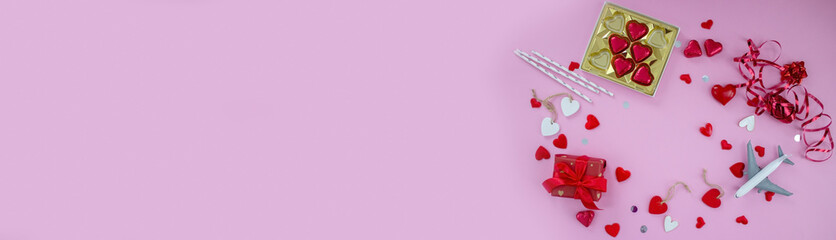 Valentine's Day holiday concept. On a pink background, valentine's day. Airplane travel.