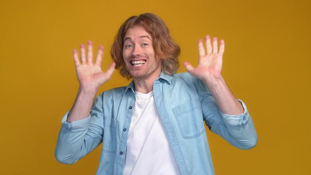 Delighted ecstatic guy fist up lottery fortune isolated vivid color background