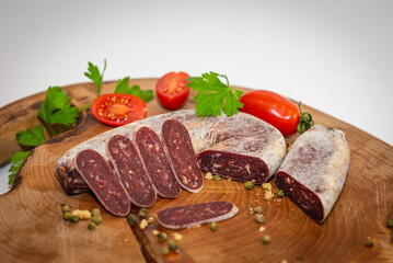 Fresh meat and vegetables on wooden boards