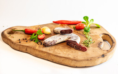 Fresh meat and vegetables on wooden boards