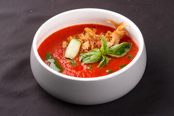 Gazpacho, with tuna shavings and green butter.