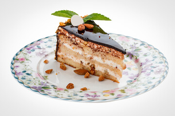 Cake with caramel nuts and chocolate frosting.