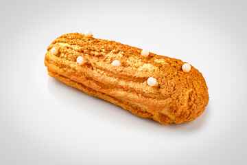 Eclair. Custard cake with buttercream.