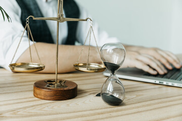 Male lawyer working with contract papers and wooden gavel on tabel in courtroom. justice and law ,attorney, court judge, concept.