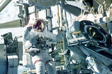 Tied astronaut in outer space on a space station. Elements of this image were furnished by NASA