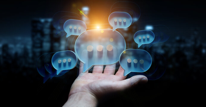 Businessman in dark using digital speech bubbles talk icons. Minimal conversation or social media messages floating over user hand. 3D rendering