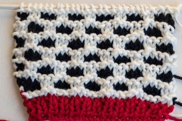 knitting background featuring honeycomb stitch in chunky yarn 