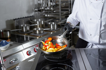 chef preparing ludo in a restaurant for guests