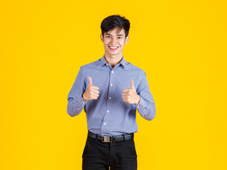 Portrait studio shot of millennial Asian young male professional successful businessman...