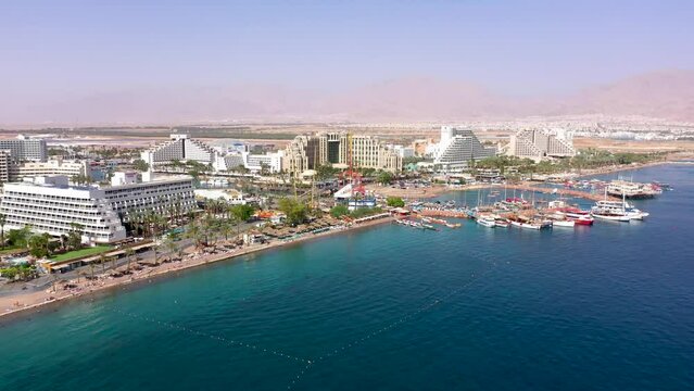 Aerial footage of hotels and resorts Eilat's coastline, a beautiful city at south Israel on the Red Sea shore