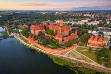 Fototapeta na wymiar Beautiful Malbork castle over the Nogat river, Poland