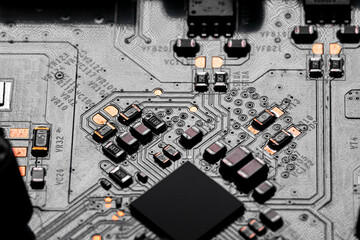 Close up of components and microchips on PC circuit board.