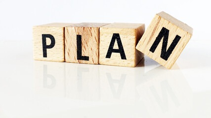 Plan the word arranged with wooden letters.