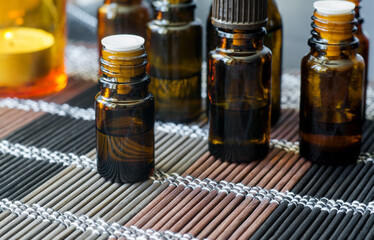 Small bottle with essential oil (extract, tincture, infusion, perfume). Aromatherapy, spa and...