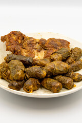 Meat leaf wrapping. Traditional Mediterranean flavor. Wrapping leaves on a white background. local name etli yaprak sarma
