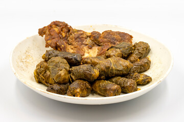 Meat leaf wrapping. Traditional Mediterranean flavor. Wrapping leaves on a white background. local name etli yaprak sarma