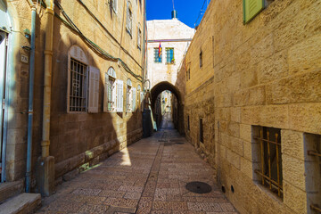 An old and ancient alley paved with stone tiles, in the Jewish Quarter - in the Old City of Jerusalem - Israel