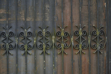 Iron Gate With Wrought Ornament On