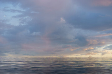 Naklejka na ściany i meble Seascape with evening overcast sky over the sea